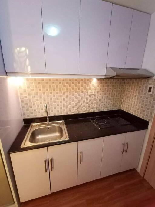 Cozy Studio Unit At Sun Residences 奎松市 外观 照片